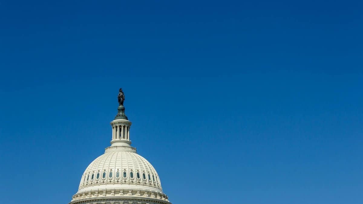 Stunning view of the US Capitol Dome in Washington, DC, with clear blue sky.