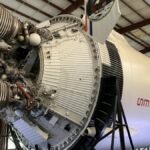 Close-up of Apollo 12 rocket engine on display at Space Center Houston.