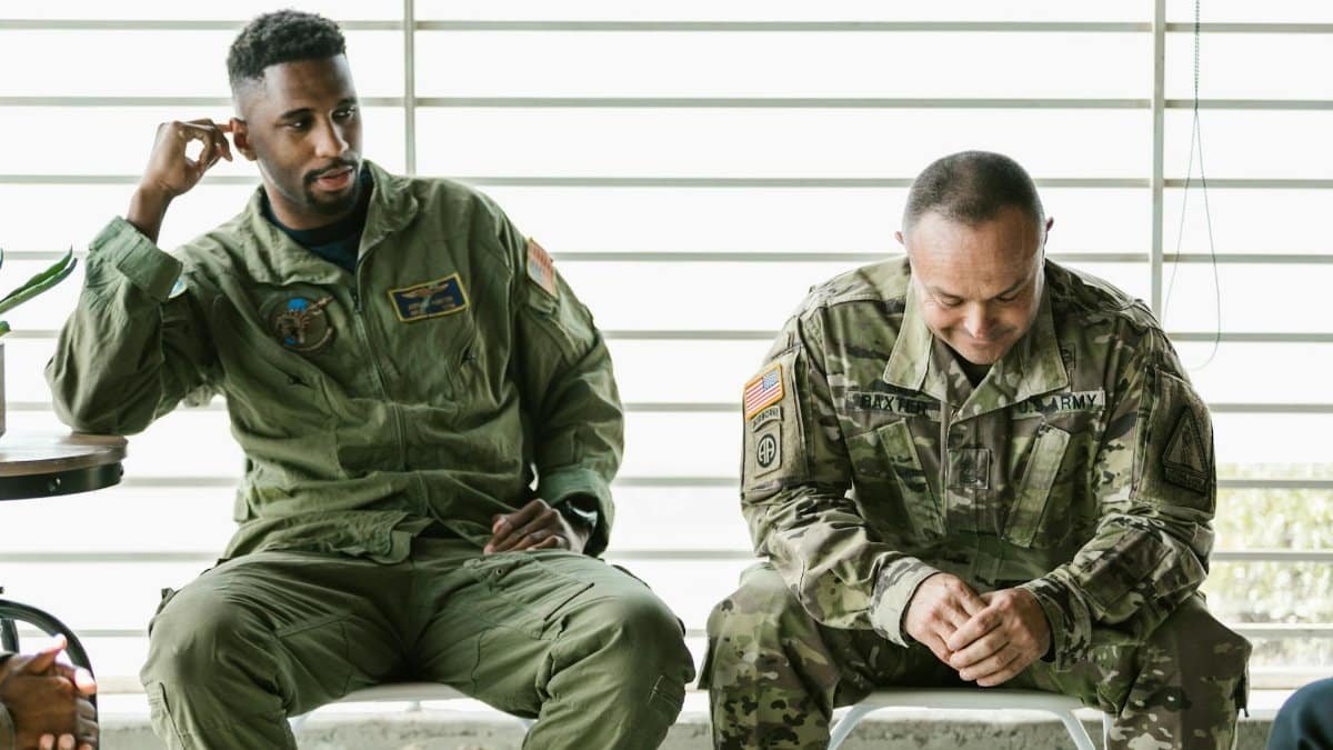 Military veterans engage in a therapeutic group session focused on healing and support.