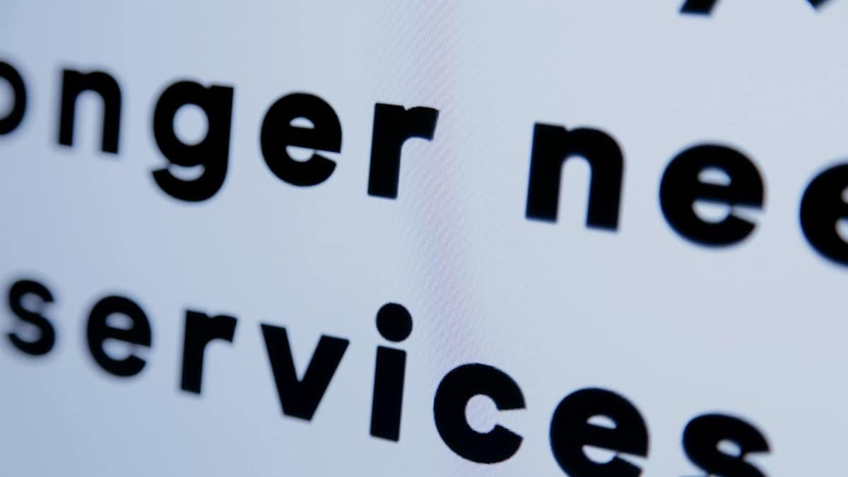 Close-up of black text on a white screen emphasizing 'services'.