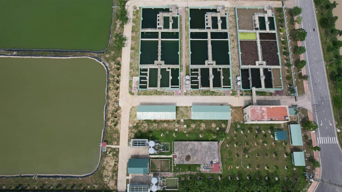 Bird's eye view of a water treatment facility in Hiệp Hòa, Bac Giang, Vietnam showing ponds and infrastructure.