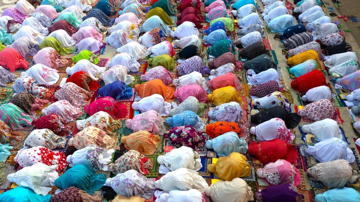 Aerial view of a vibrant group prayer in Indramayu, Indonesia.