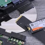Contrasting data storage technologies: NVMe SSD, HDD, and CD.