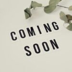 Eucalyptus branch with 'Coming Soon' message on white background for announcements.