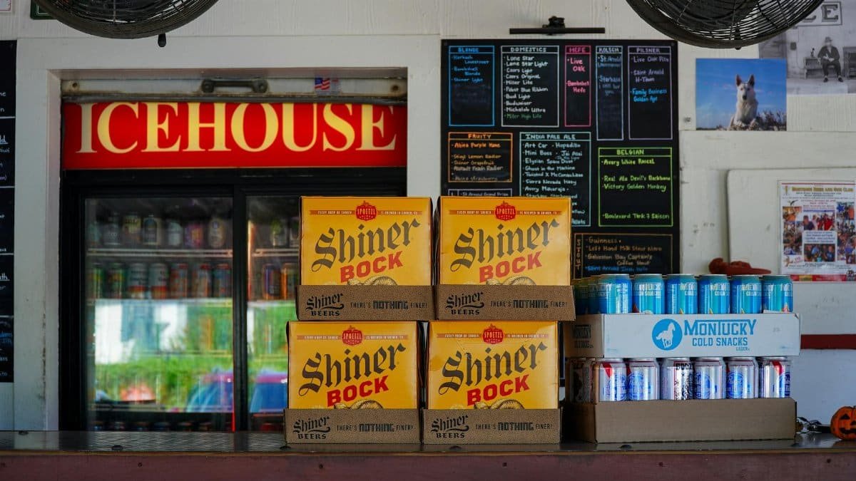 Stacks of Shiner Bock beer cases at an icehouse bar in Houston, Texas.