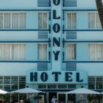 Colony Hotel in Miami Beach, iconic Art Deco architecture with classic cars.