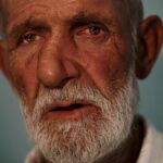 Close-up portrait of an elderly man with a beard and mustache in Dagestan, Russia.