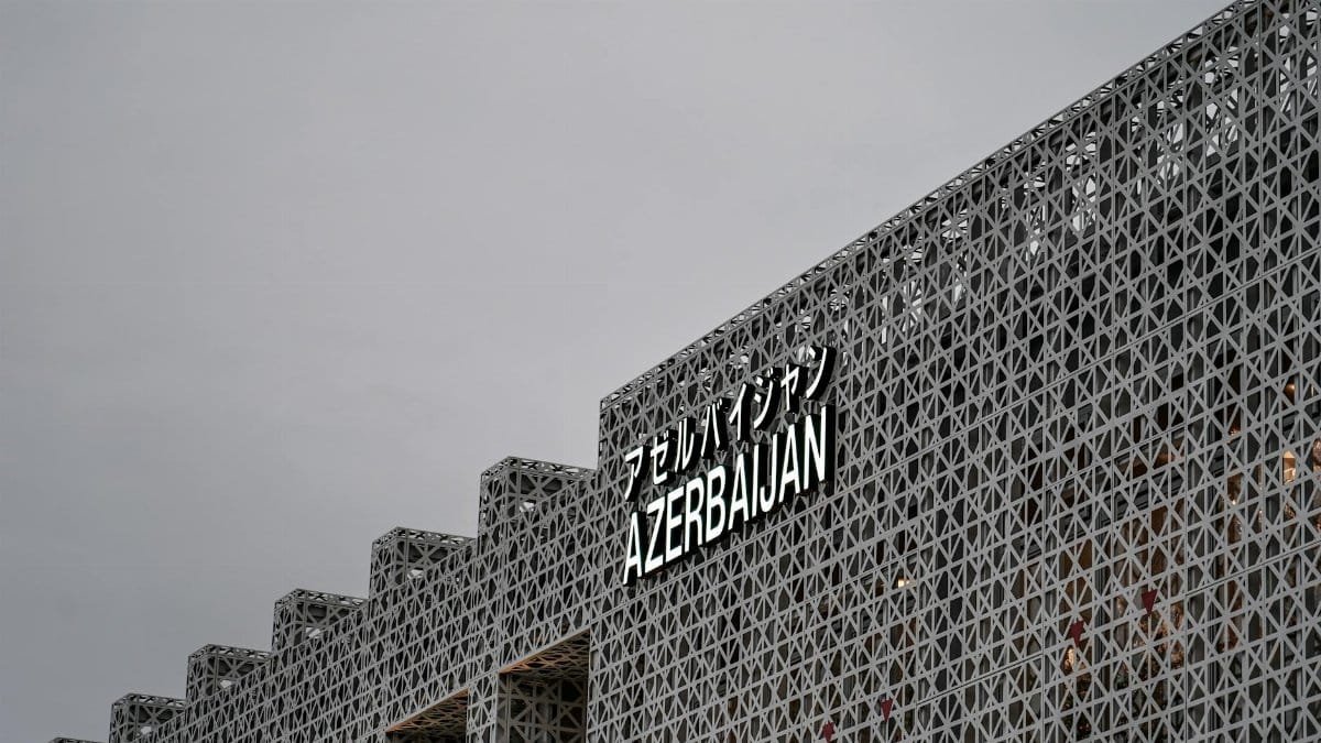 Contemporary geometric facade with 'Azerbaijan' text in Osaka, Japan, capturing modern architectural design.