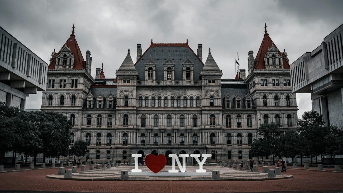 Captivating facade of the New York State Capitol with iconic I ❤️ NY sculpture.
