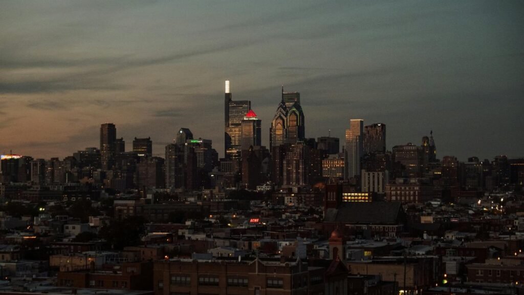A stunning view of Philadelphia's skyline at twilight, showcasing iconic skyscrapers.