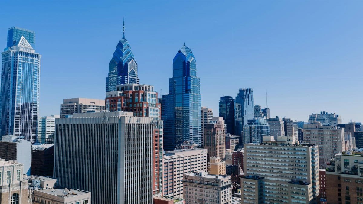 Aerial view of Philadelphia's skyline showcasing iconic skyscrapers on a clear day.