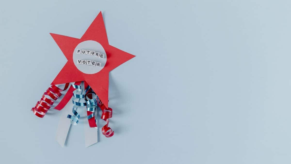 Red star with 'Future Voter' text and ribbons on a pastel blue background.