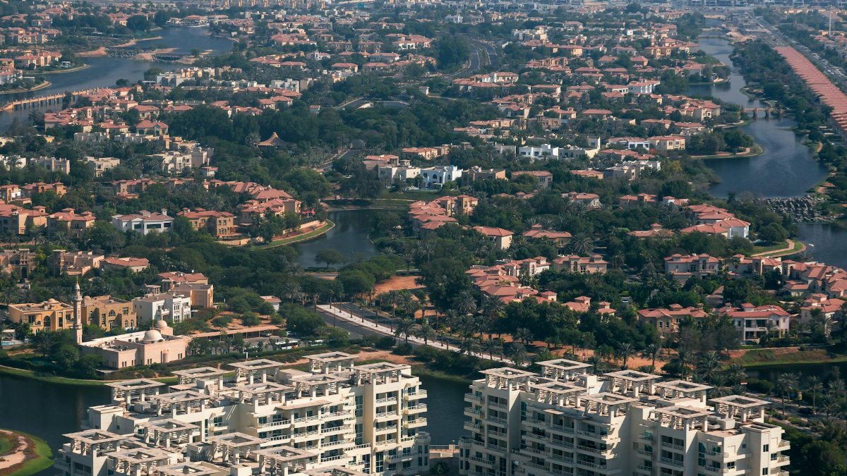 A stunning aerial view of the lush Jumeirah Island housing community in Dubai, UAE.
