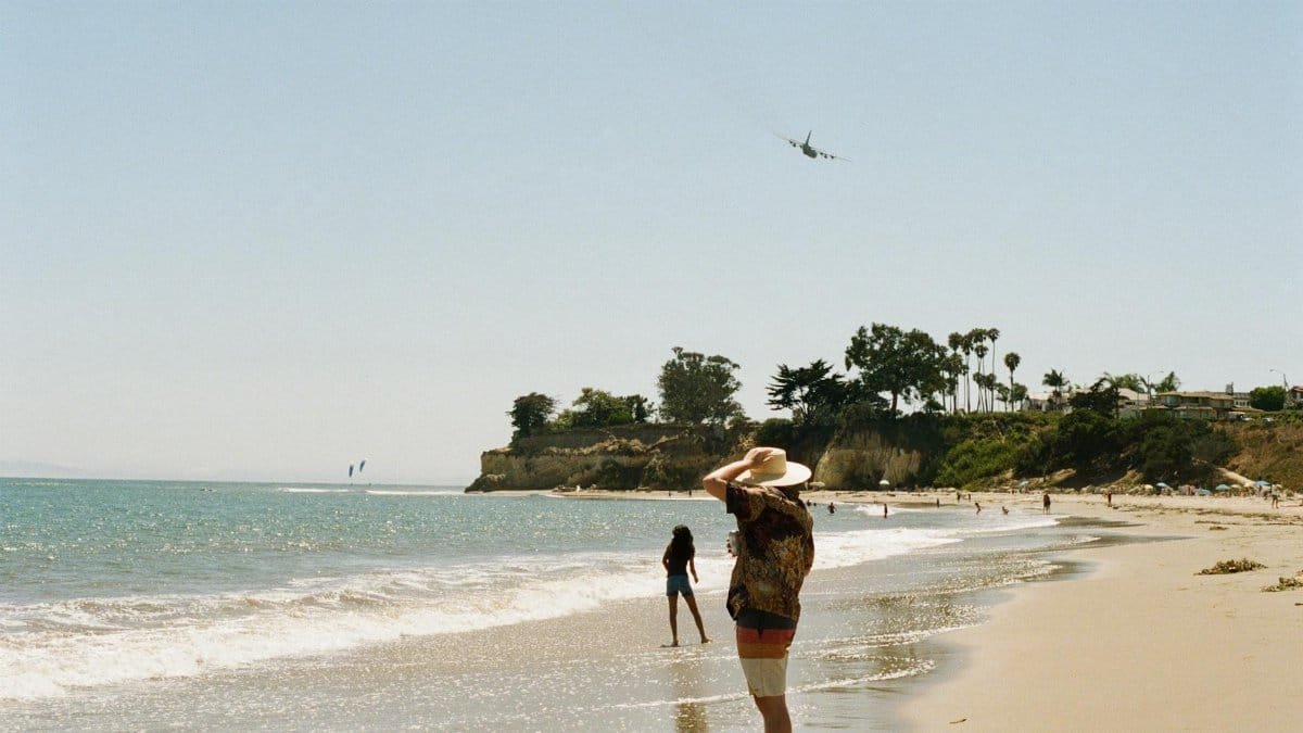 Relaxing day at Santa Barbara beach with people enjoying the ocean view.