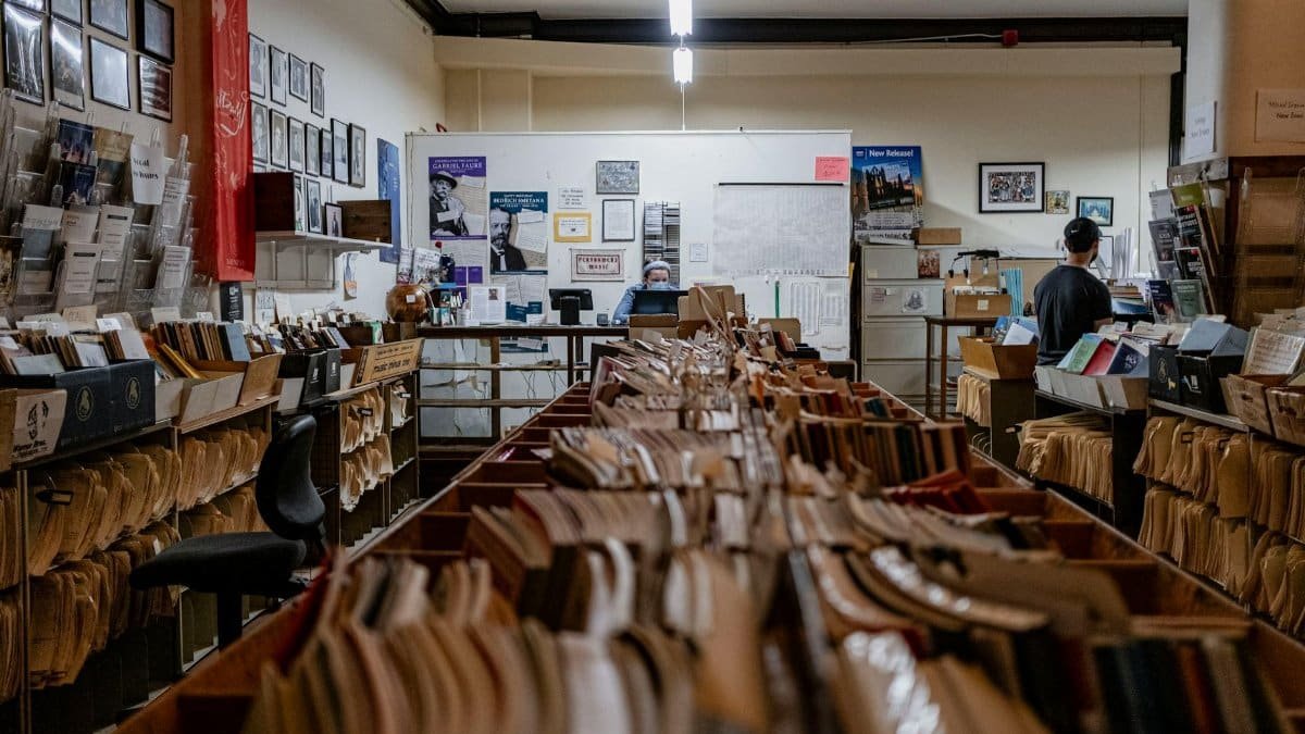 A cozy and nostalgic record store interior filled with vinyl records and vintage decor.