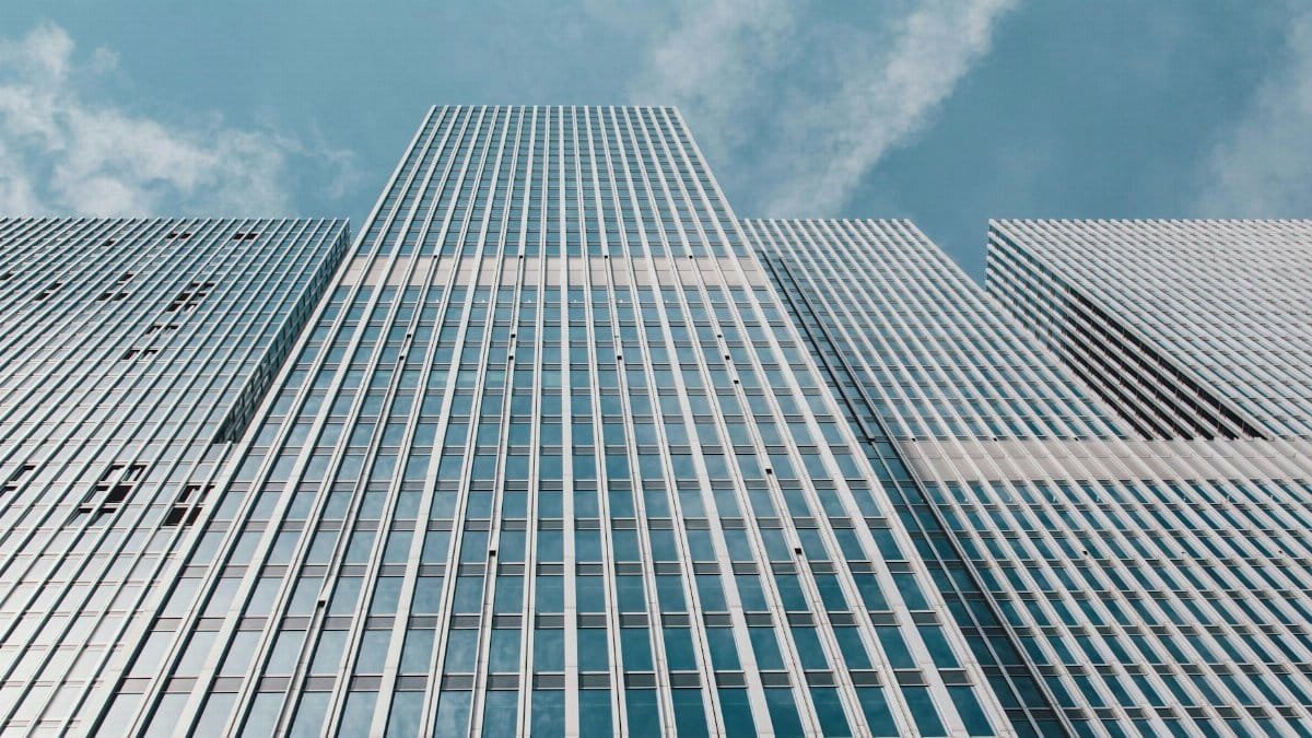 Low angle view of contemporary skyscrapers against a clear sky in Almere, Netherlands.