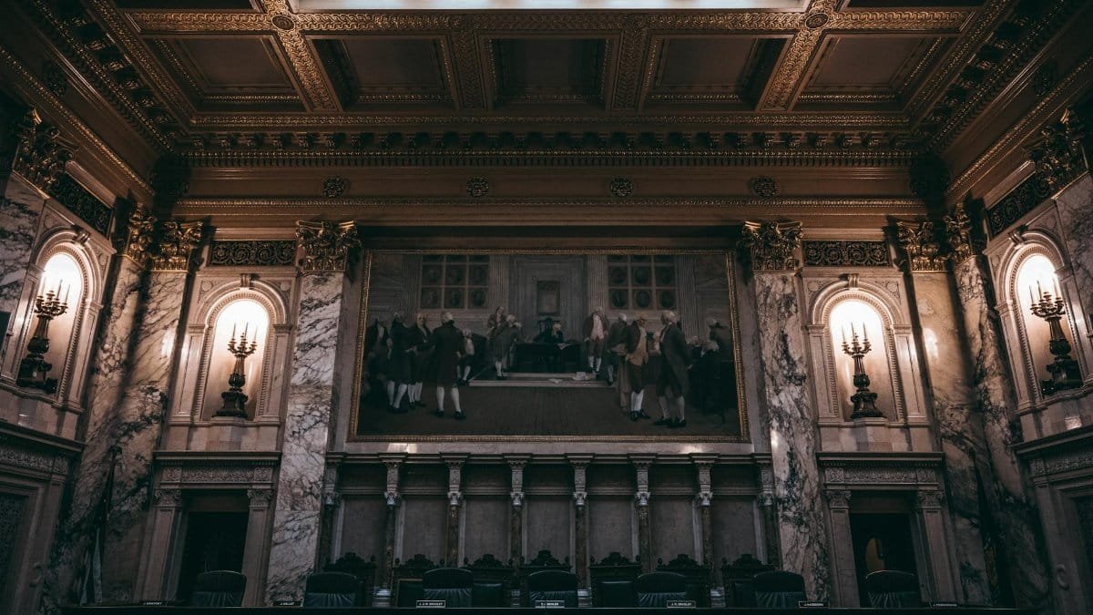 Baroque architecture inside Wisconsin State Capitol in Madison, WI, featuring intricate design and historic artwork.