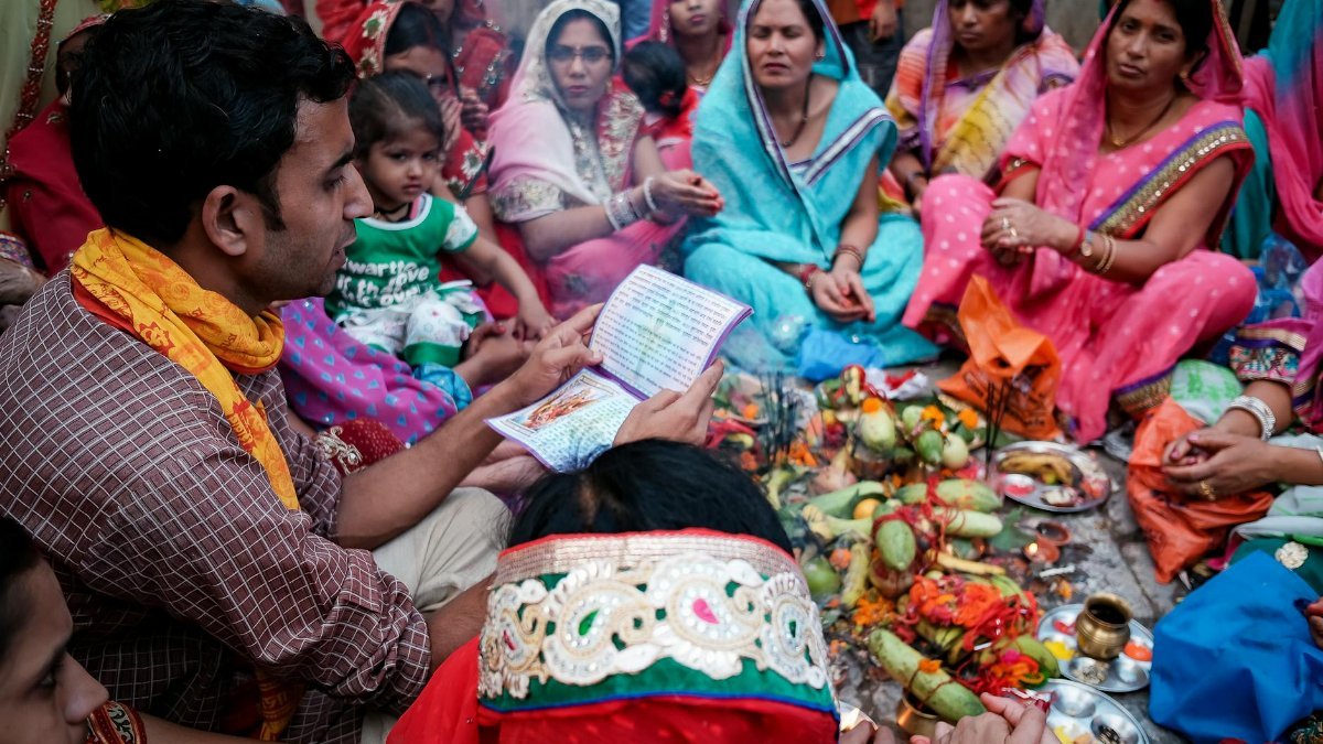 Colorful gathering in Nepal showcasing traditional clothing and rituals.