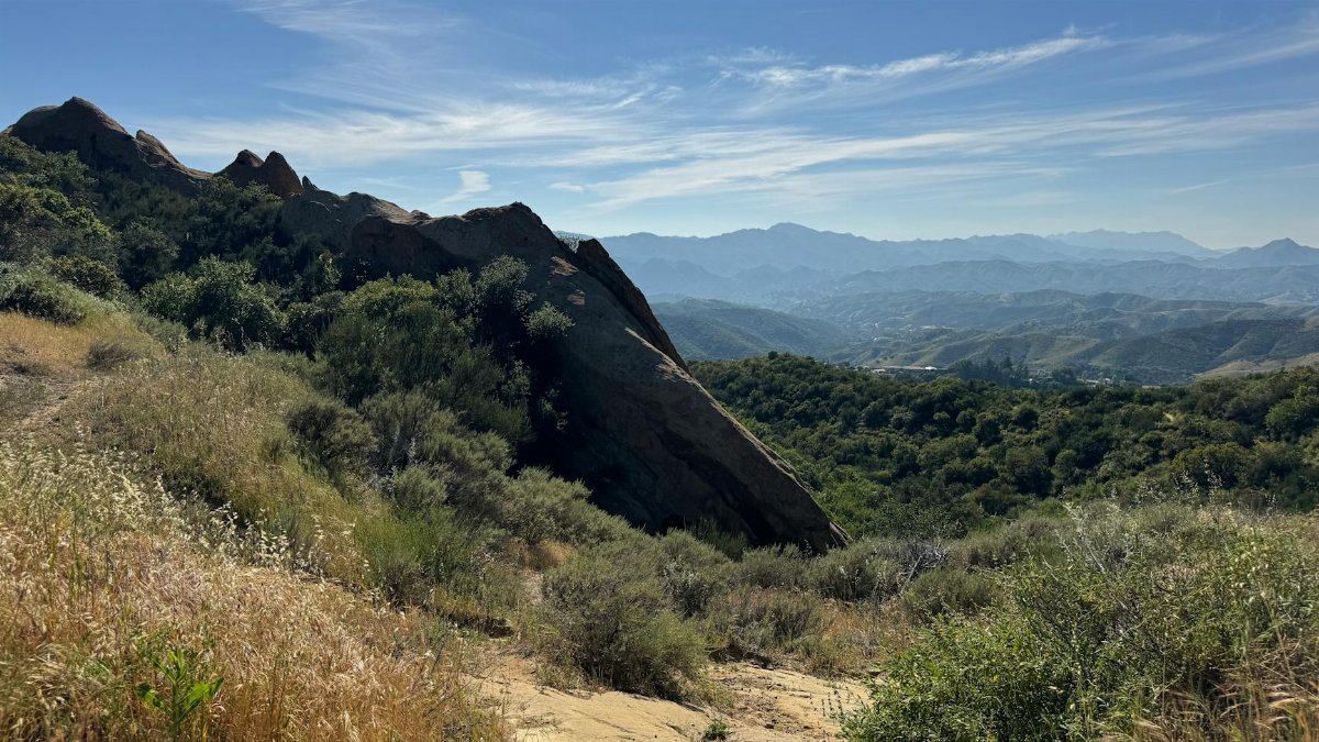 Breathtaking landscape view of the Santa Monica Mountains under a clear blue sky.