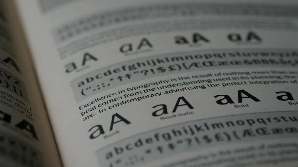 Detailed close-up of typography showcasing various fonts and text styles in a book.