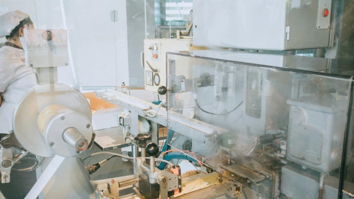 Close-up of advanced machinery in a modern laboratory setting, highlighting technology and industry.