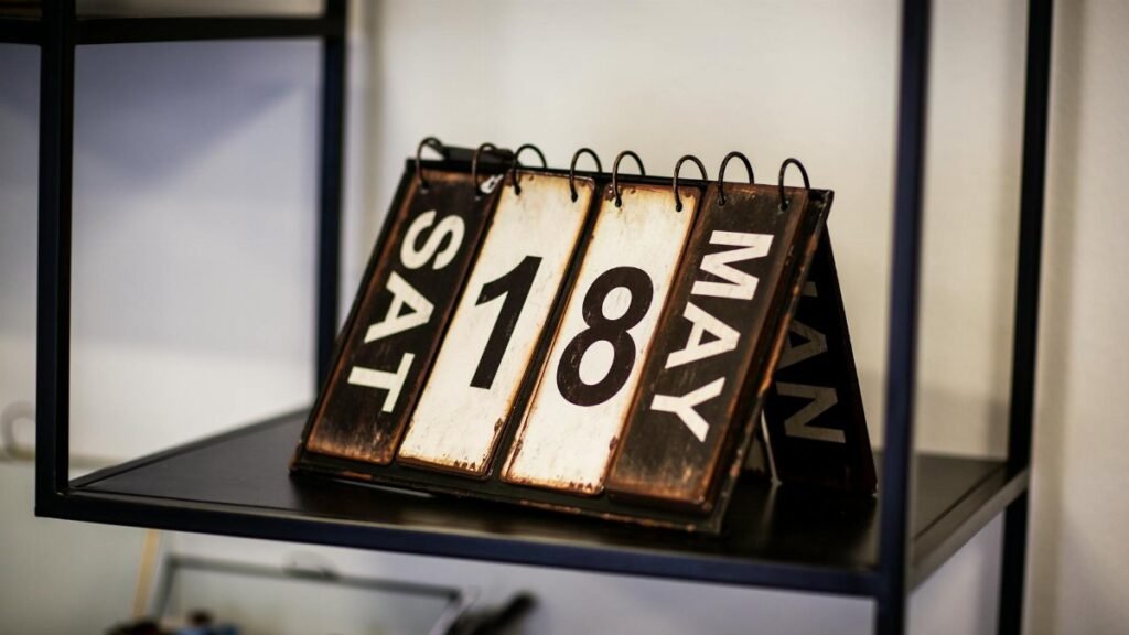 Rustic vintage calendar showing May 18th, perfect for antique decor aesthetics.