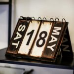 Rustic vintage calendar showing May 18th, perfect for antique decor aesthetics.