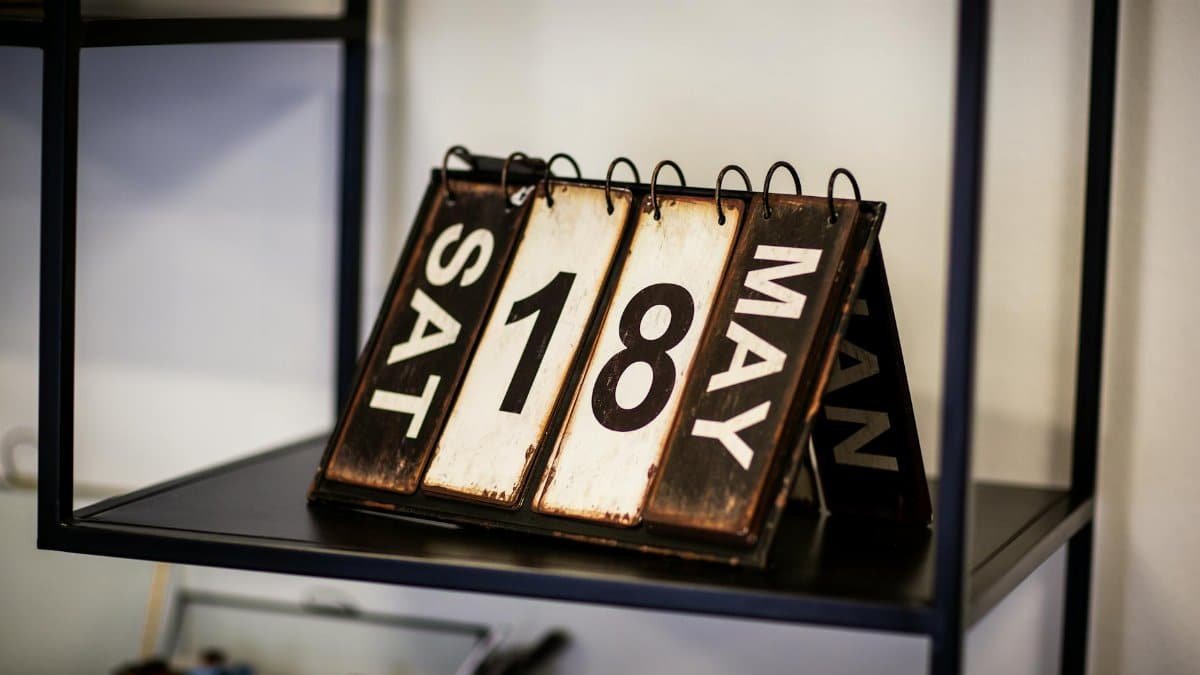 Rustic vintage calendar showing May 18th, perfect for antique decor aesthetics.