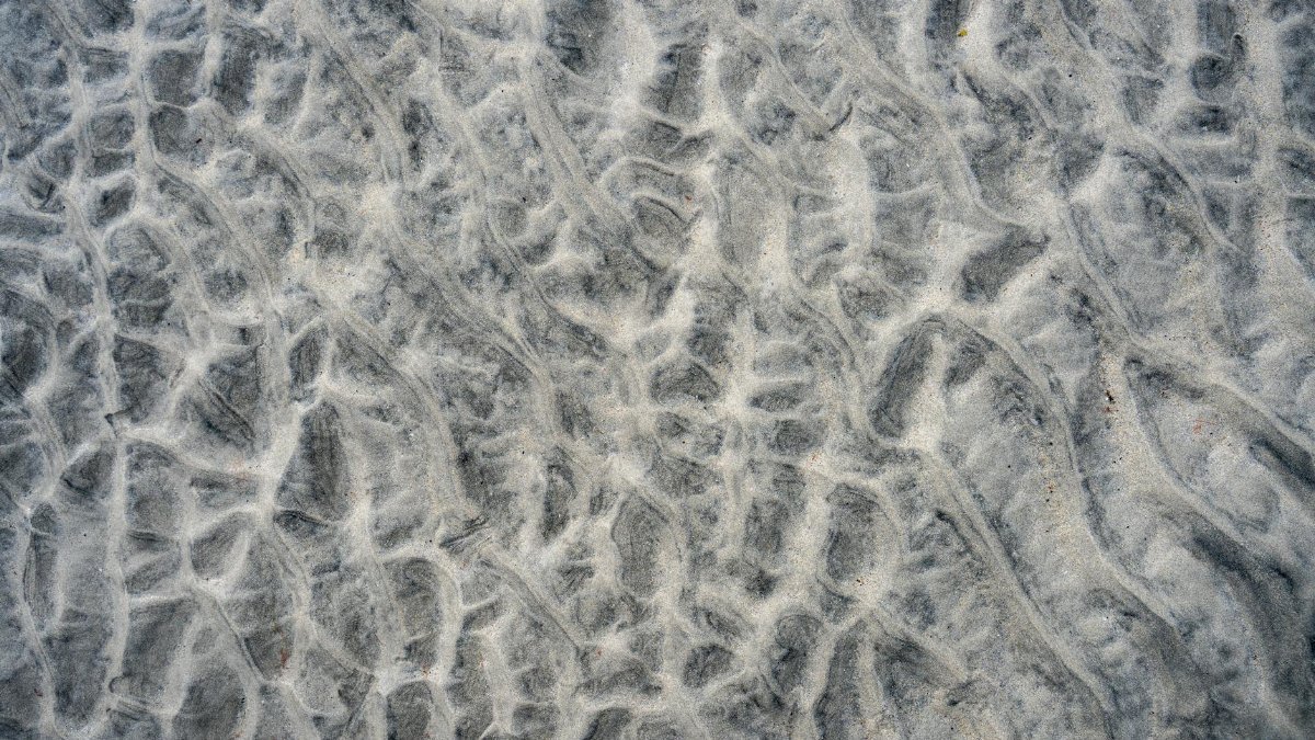 Abstract overhead view of textured sand patterns on Luskentyre Beach, Harris, Scotland.