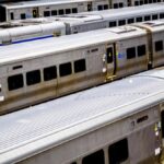 Aerial view of Long Island Rail Road trains in a station in New York. Perfect for travel and transportation themes.