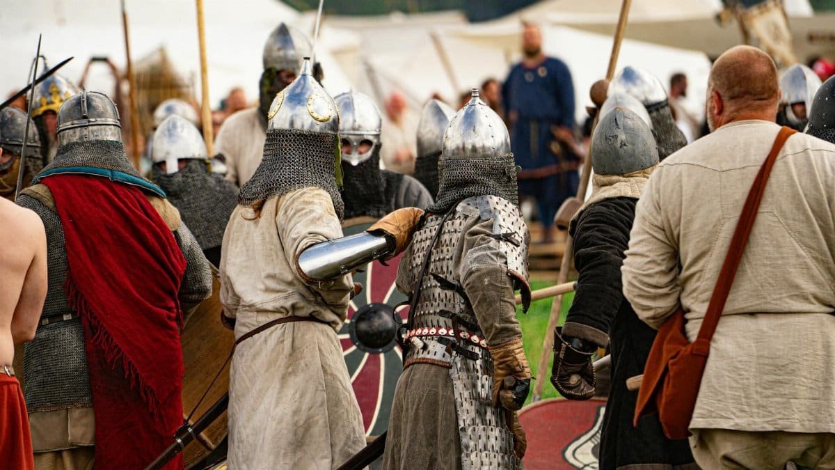 Viking warriors reenact a battle scene during a historical festival in Szczecin.