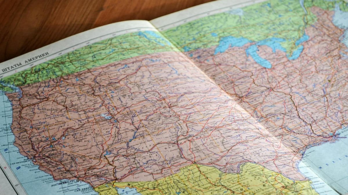 High-angle view of a vintage map depicting the United States with intricate details.