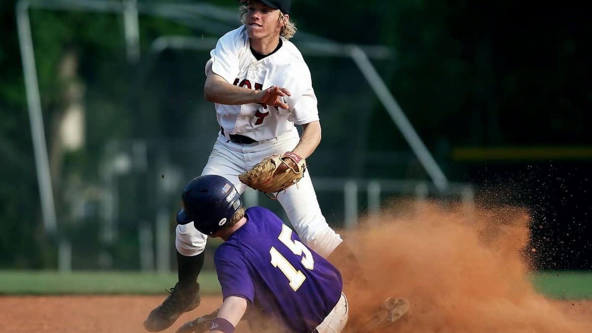 Dramatic baseball scene with players in action during a game.