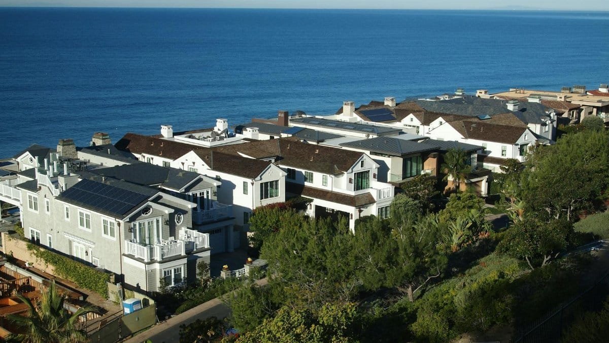 Stunning aerial view of coastal homes and the ocean in Dana Point, California.