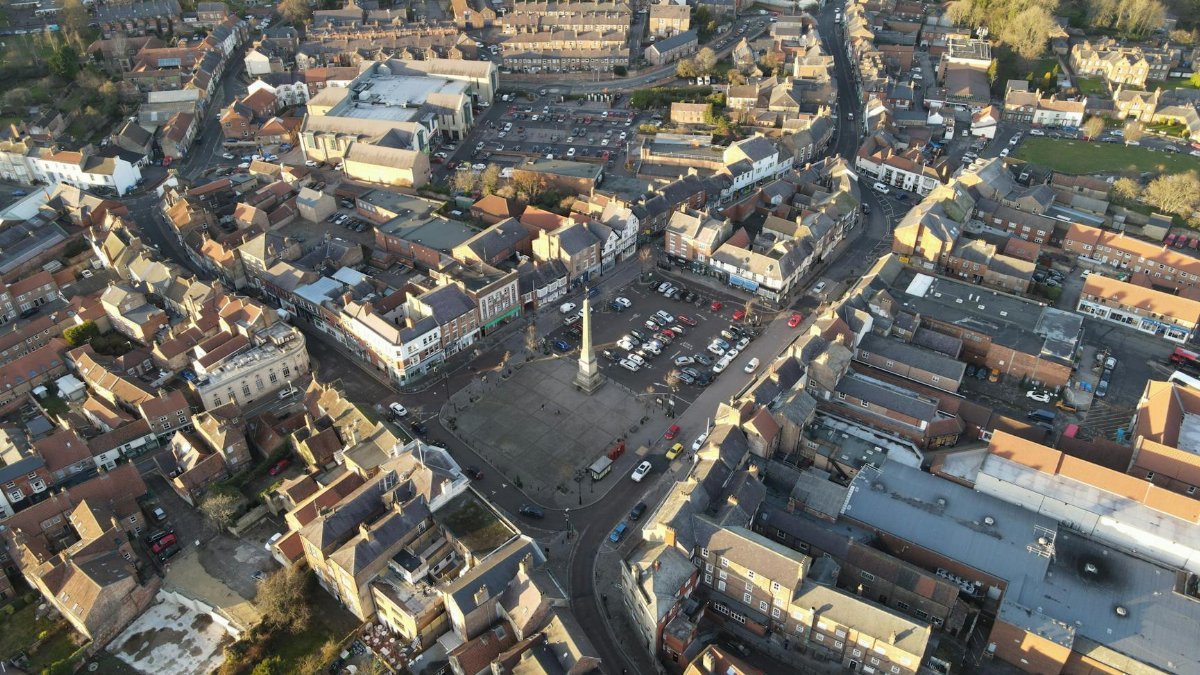 Drone shot of Ripon Market Square, showcasing the charming layout of the historic town in England.