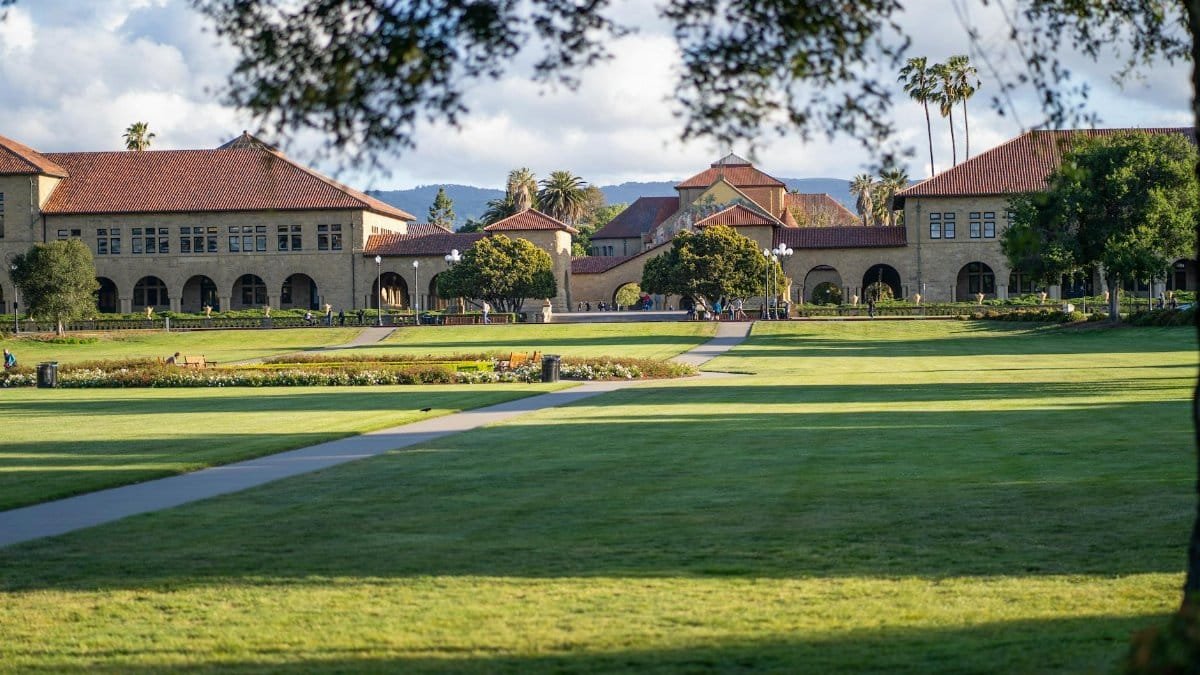 Serene view of Stanford University's iconic campus buildings and lush gardens.