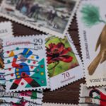A mix of vibrant vintage postage stamps featuring seasonal and nature themes.