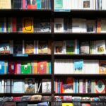 Wide array of books on a shelf in a cozy bookstore in Ankara, Türkiye.