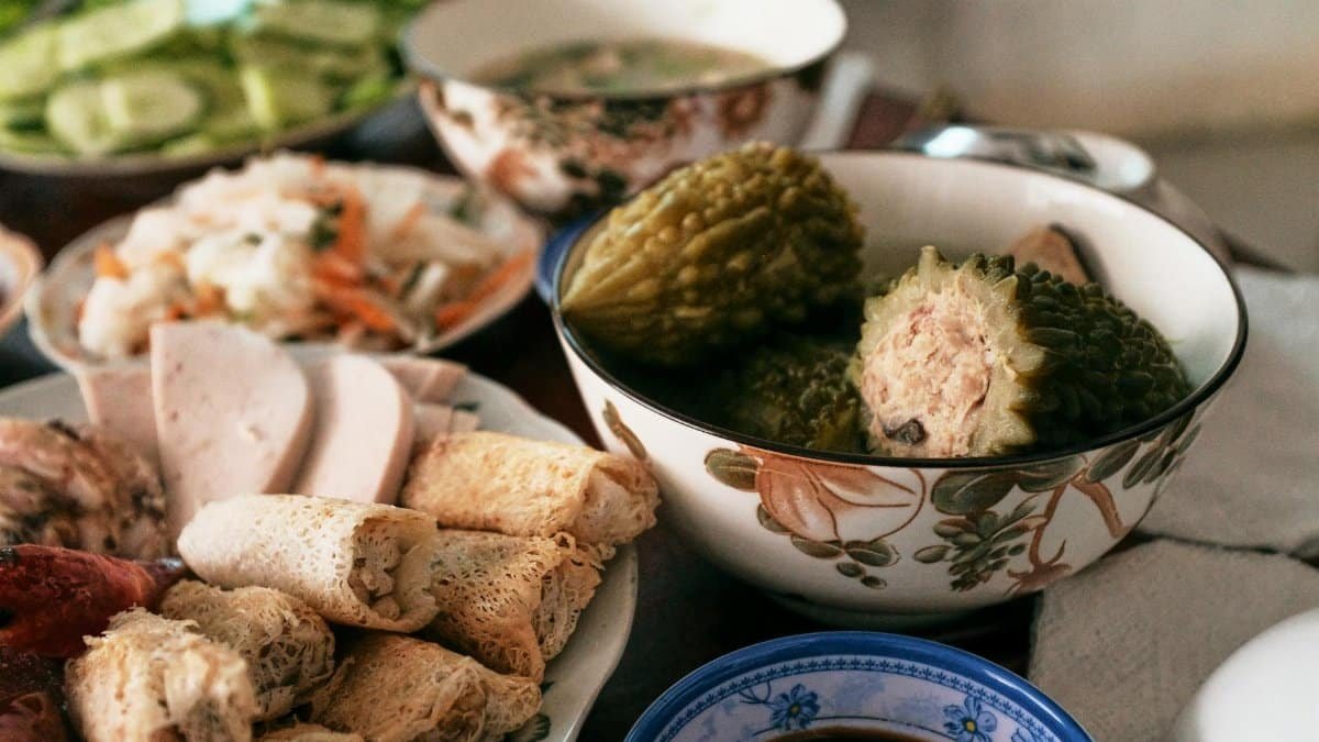 A sumptuous Vietnamese meal set for Tet with traditional dishes, showcasing vibrant culture.