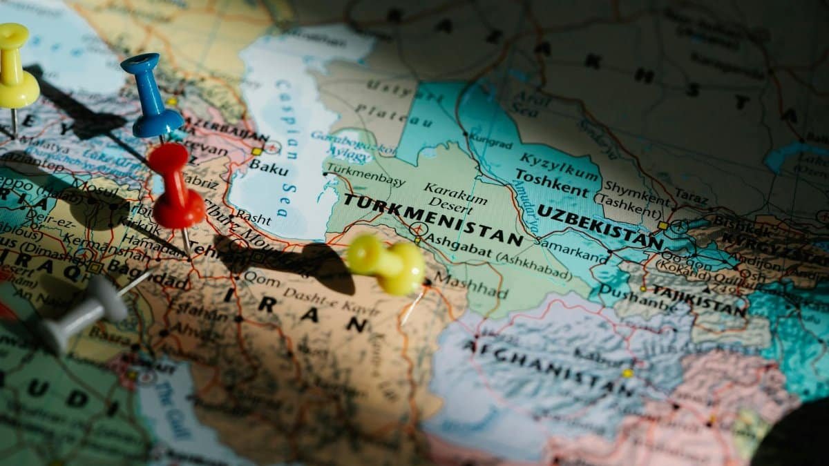 Colorful pushpins marking locations on a detailed map of Central Asia.