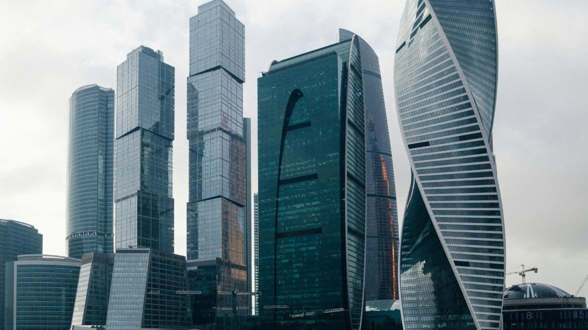 Aerial view of modern skyscrapers in Moscow, showcasing futuristic architecture and urban expansion.
