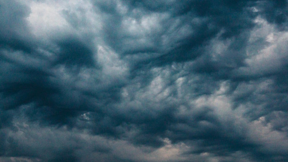 Capture of a dramatic stormy sky with dark clouds over Gdańsk, Poland, highlighting the breathtaking weather phenomenon.