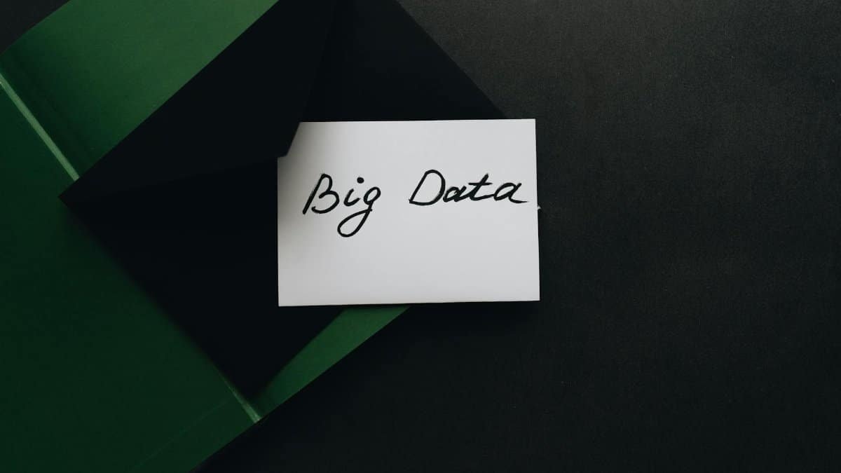 A minimalist photo of a card with 'Big Data' text inside a green envelope, showcasing modern concepts.