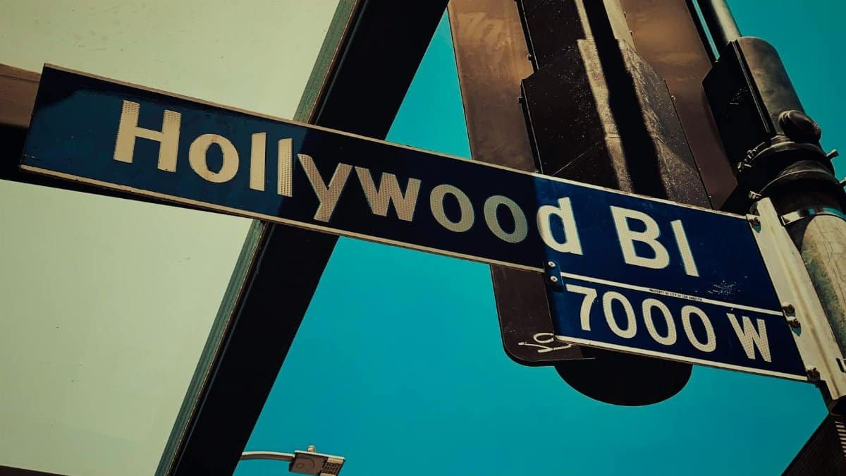 Street sign for Hollywood Boulevard in sunny Los Angeles, highlighting the iconic location.