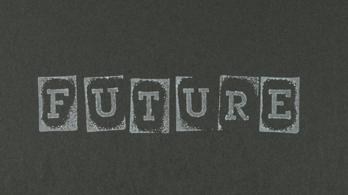 A textured vintage typography design spelling 'FUTURE' on a dark gray background.