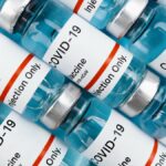 High-quality image of COVID-19 vaccine vials, perfect for healthcare themes.