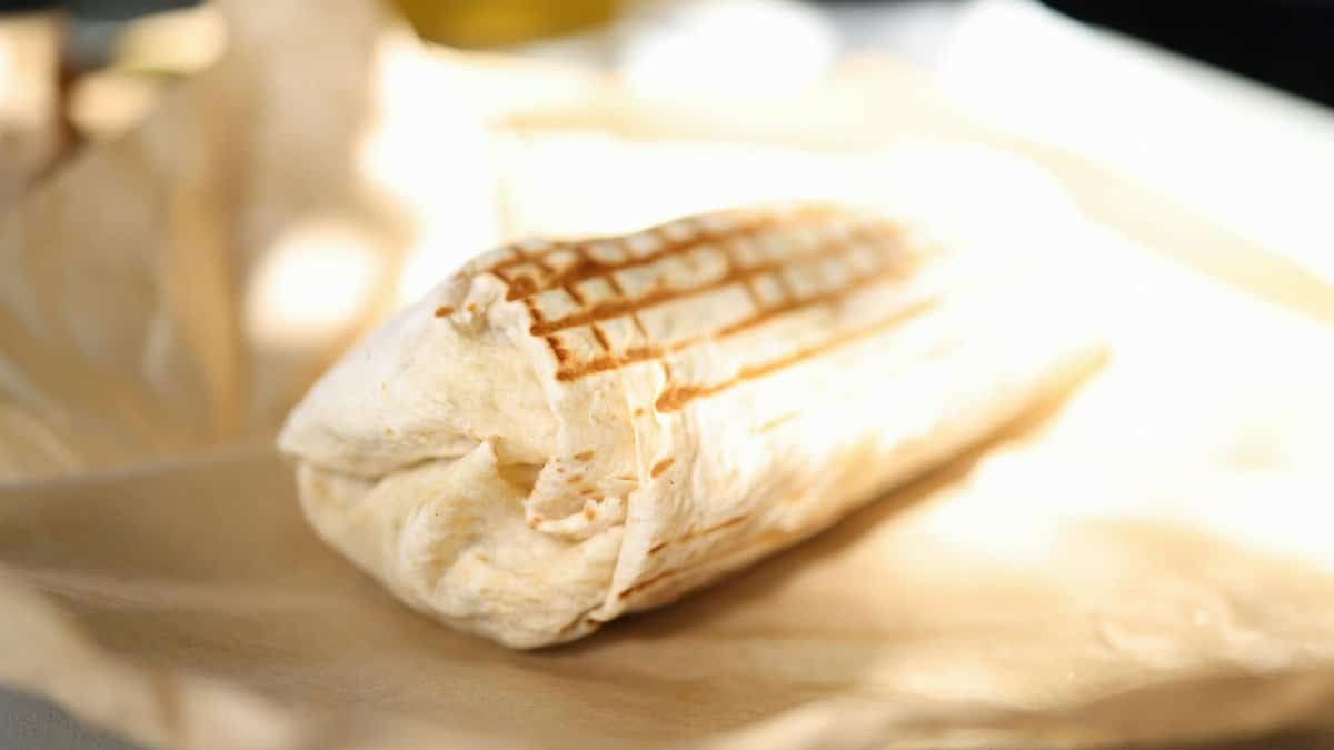 Close-up of a freshly grilled doner wrap, showcasing its texture and appeal.