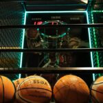 Close-up view of basketballs lined up for an arcade basketball hoop game.