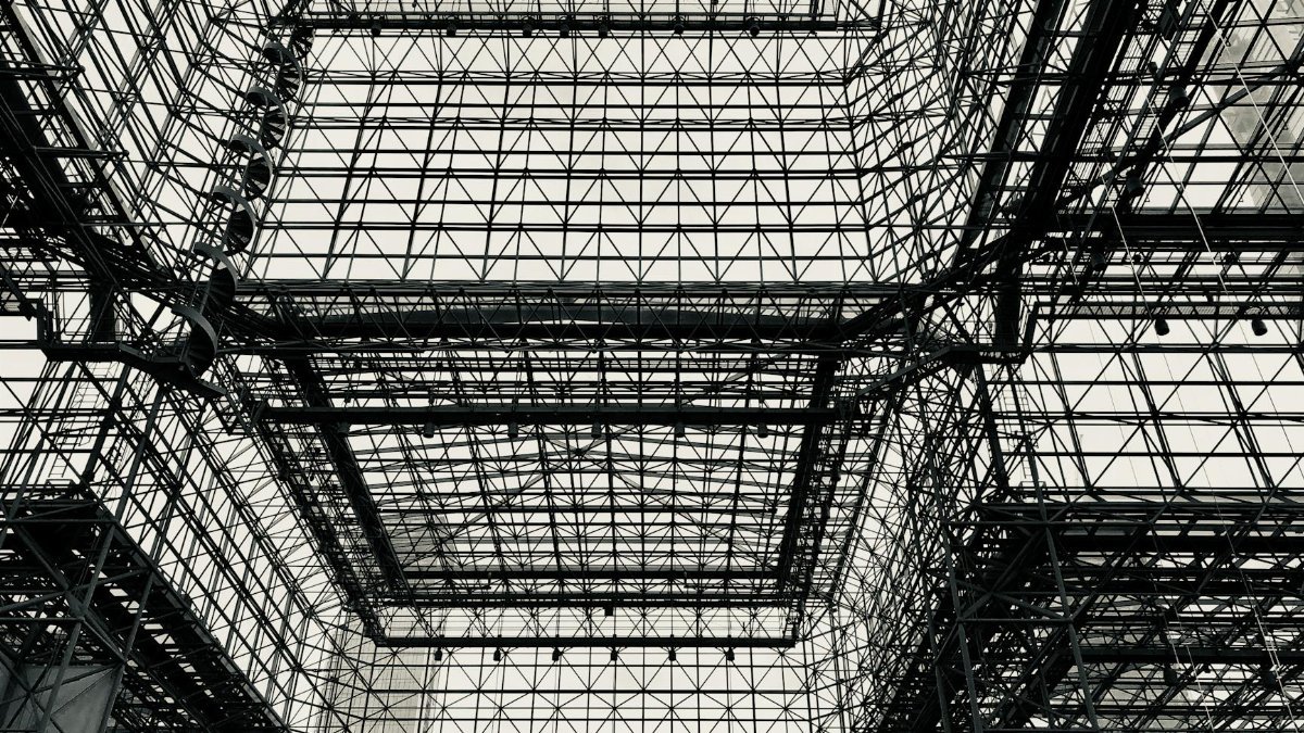 Intricate structural framework of a modern building in New York City, showcasing architectural design.
