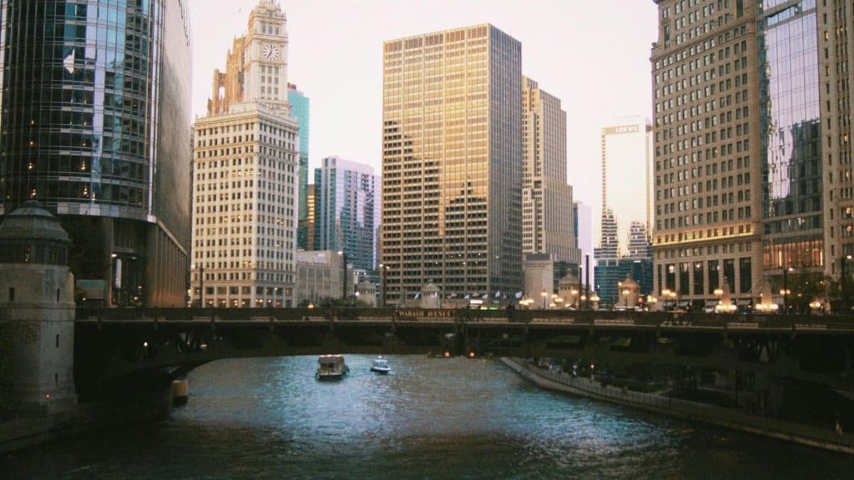 A picturesque view of Chicago's river and skyline showcasing historic landmarks and skyscrapers.